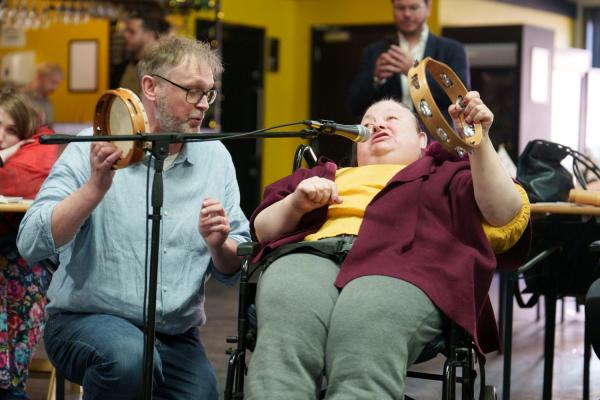 Pyramid High Rise Group member sings with Leeds Song musician