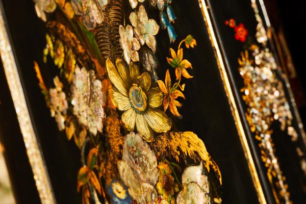 A close-up of a floral still-life painting