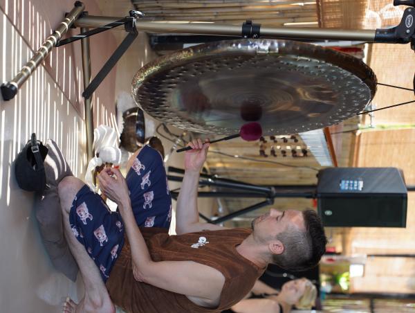 Jim Halloran from Sarl Sound Healing gently playing a gong