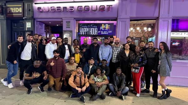 Group photo outside Queens Court