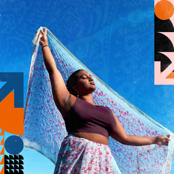 a person holding up some cloth while looking up to the sky