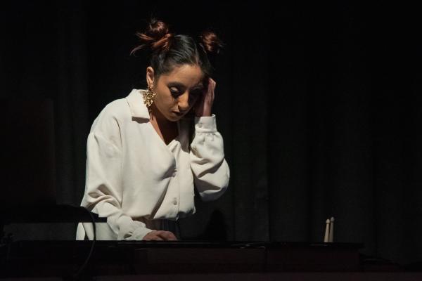 Neeta Sarl as the DJ in Human Nurture