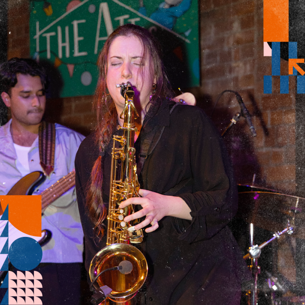 A person playing the saxaphone