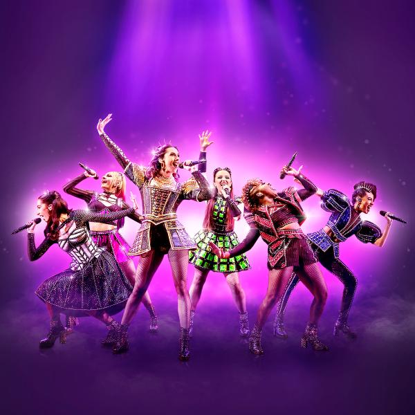 SIX queens singing into microphones wearing modern takes on Tudio dress.