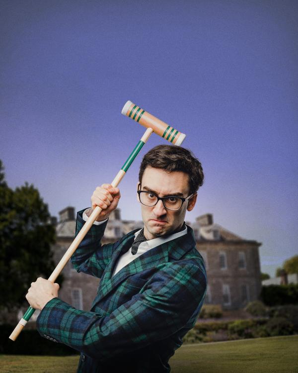 MC Hammersmith holding a croquet mallet in a menacing way!