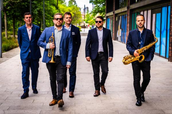 Five Way Split musicians with instruments  