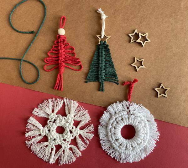 An image of 4 different macrame decorations in white, green and red.