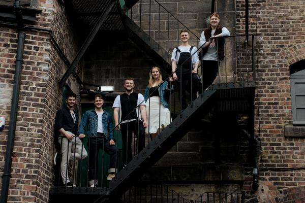 Phantom Bagman Standing on a Staircase