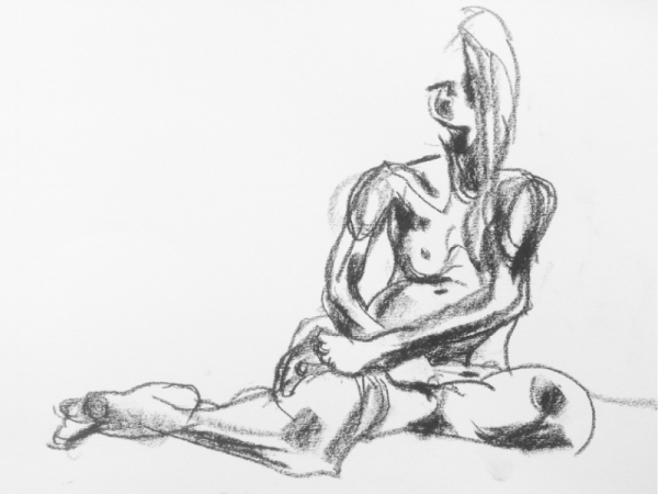 Charcoal life drawing sketch of a nude seated figure on white paper