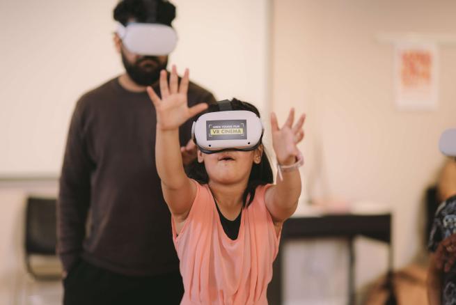 Child using Leeds Young Film Festival VR headset