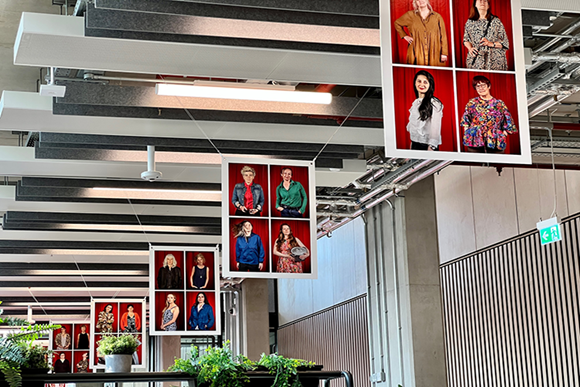 posters hanging from a celing