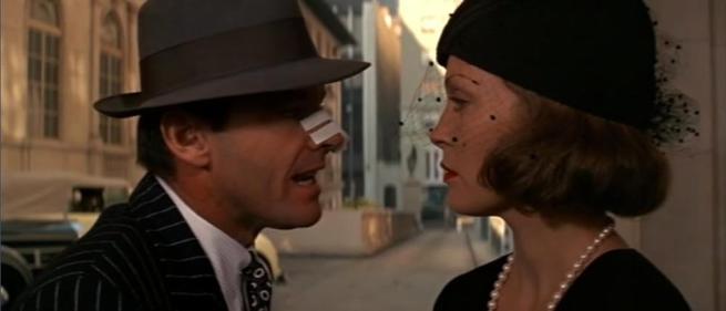 A still from Chinatown featuring J.J. Gittes and Evelyn Mulwray played by Jack Nicholson and Faye Dunaway respectively.
