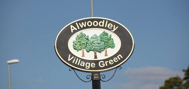 Sign for Alwoodley Village Green. 