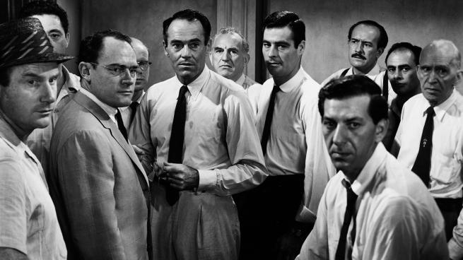 A photograph from 12 Angry Men featuring 11 of the jurors.