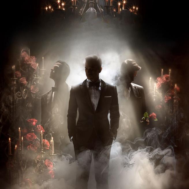 Three figures in an arrow formation are emerging from smoke in suits between bunches of red roses.