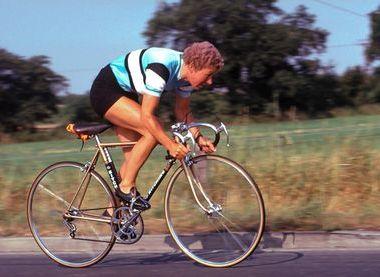 A photograph of Beryl Burton cycling