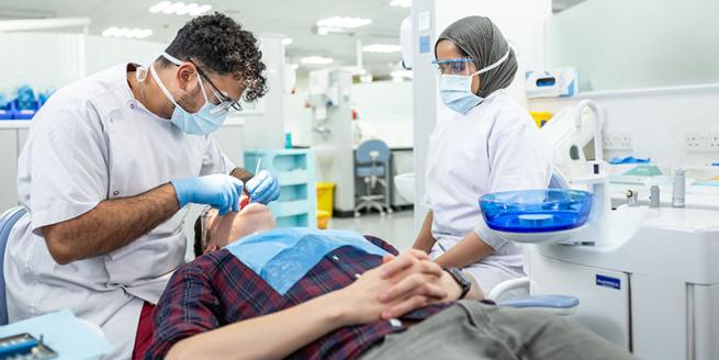 A photograph of dentists at work