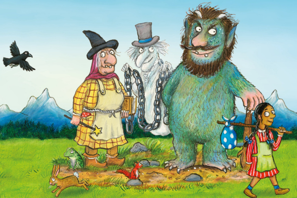 A group of bad looking characters, including a witch and a ghost, standing in a field.