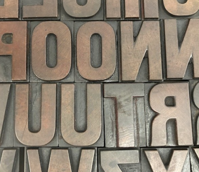 An image of a variety of letterpress blocks