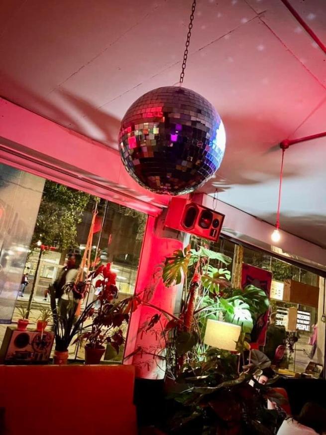 Shiny disco ball in a bar at night 