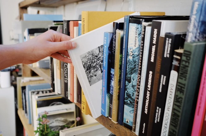 Photo books on a shelf