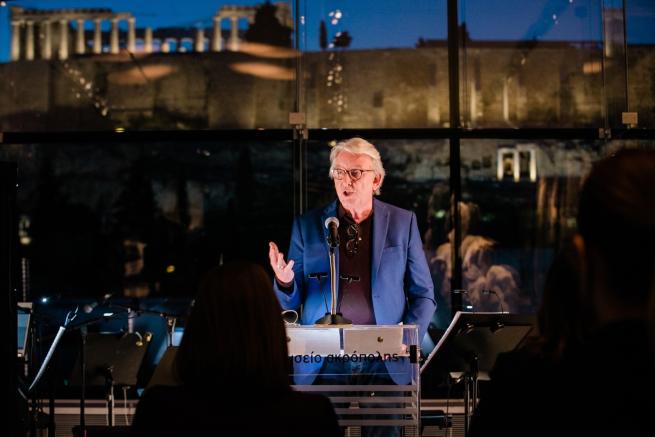 Photo of Tom Flynn speaking at the Parthenon Galleries of the Acropolis Museum