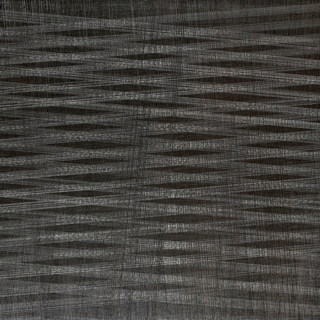 White and grey diagonal lines layered in an abstract pattern on a black background