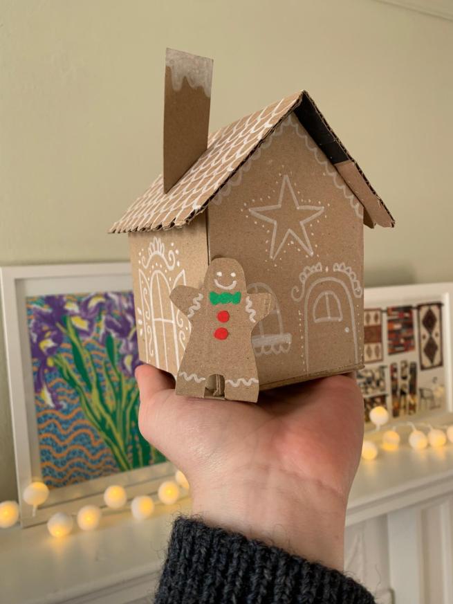 Photo of a cardboard gingerbread house.