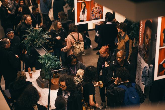 Attendees of the previous Launchpad Conference engaging in networking.