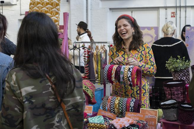 Trader stood smiling at recent Craft & Flea Makers Market