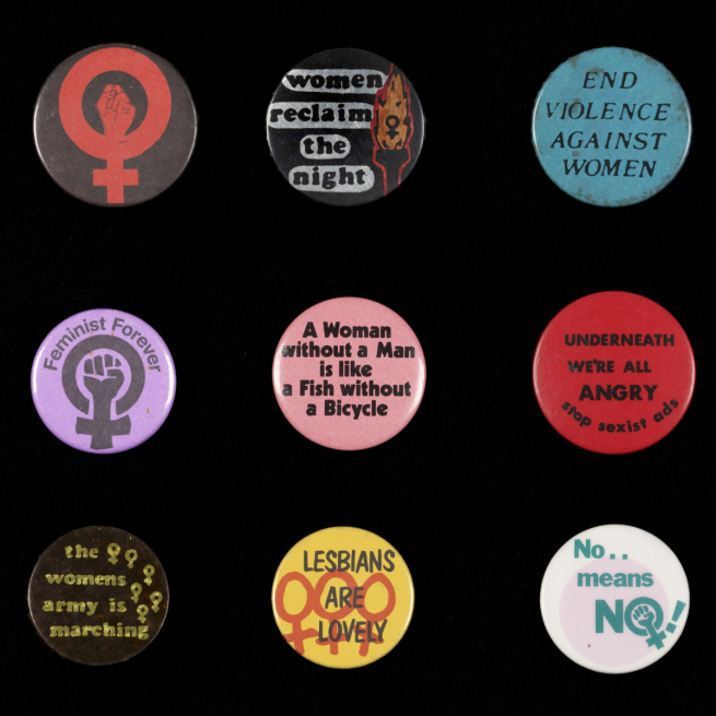 Colourful protest badges arranged in a grid layout on a black background