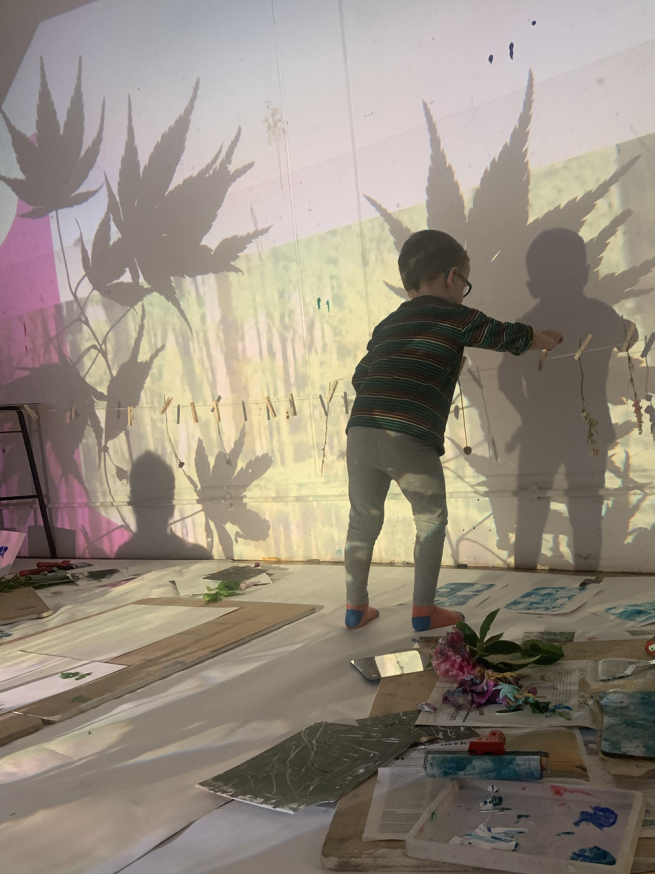 a child playing with sillhouettes