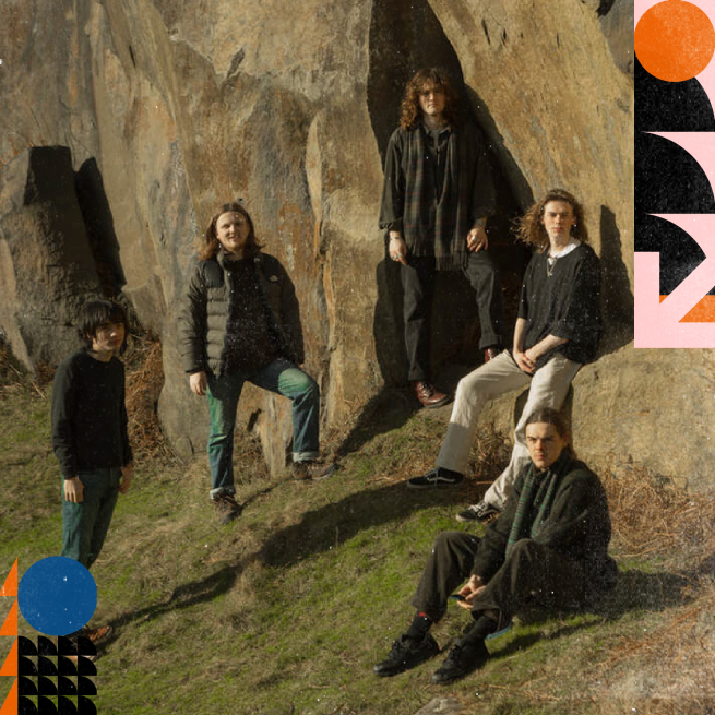 5 musicians standing and sitting. 