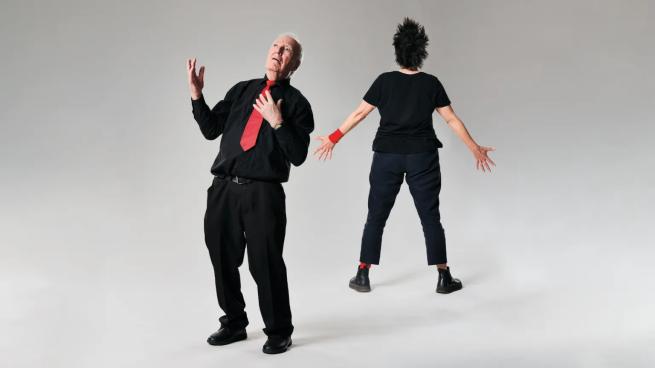Two dancers from The Performace Ensemble dance on stage