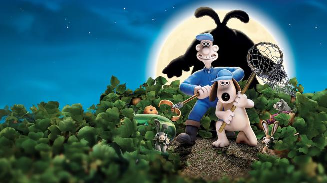 Man with grabbing tool and dog with net in a vegetable patch with rabbits and a large rabbit shadow behind them