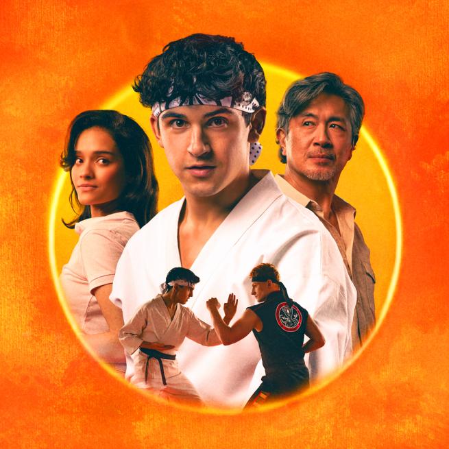 Within a circular ring of sunlight, a young man stands central in karate robes and headband, flanked by two other characters, including a young woman an older man.