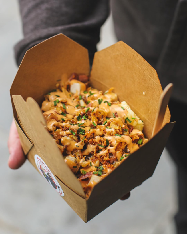 Showing an image of delicious street food in a takeaway container