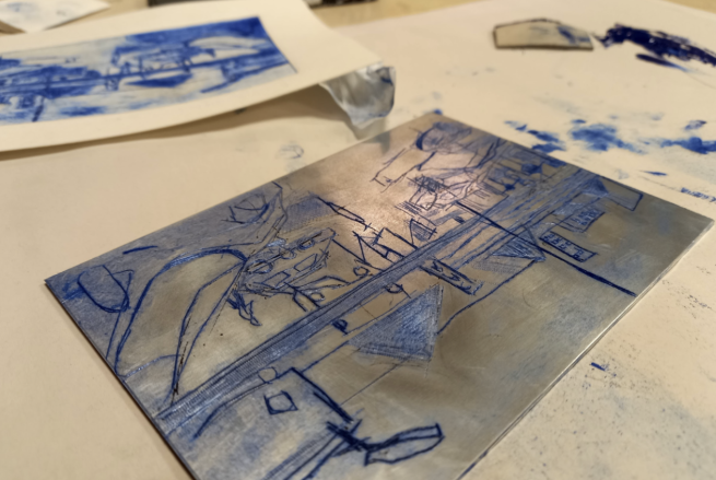 An etching plate with an image ready to be printed from