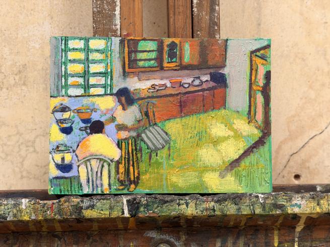 An image of a small painting on an easel