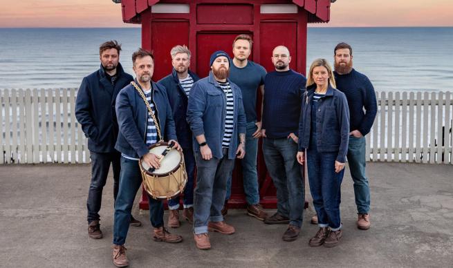 A modern shanty group stand on the sea front at Saltburn-on-sea, bedecked resplendently in blue trousers, blue jackets and blue stripey shirts. I don't think there's a fisherman amongst them!