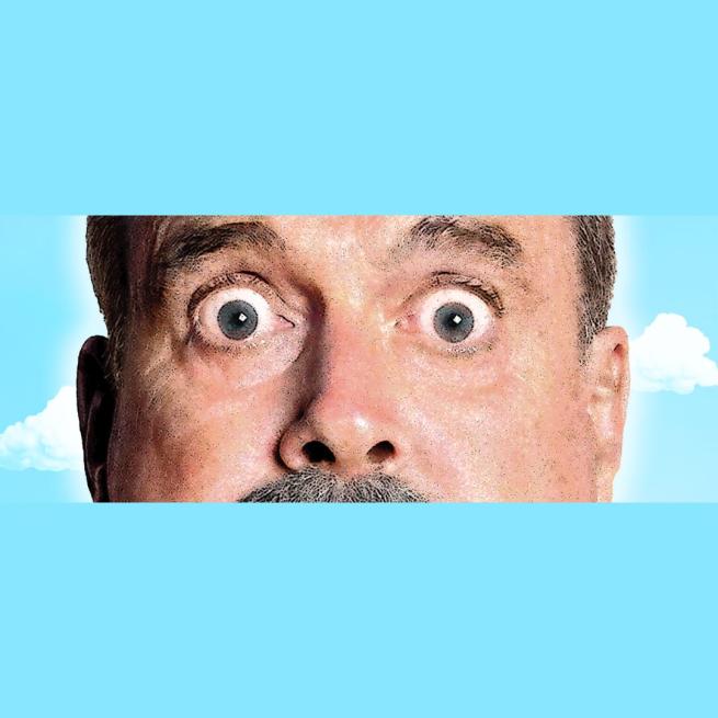 Cropped image of John Cleese's face, wide-eyed, amongst a bright blue cartoon sky.