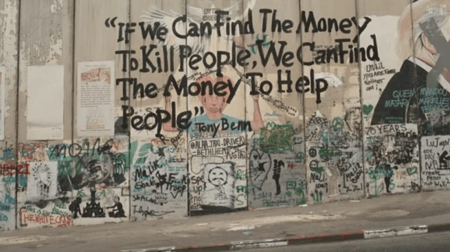 Street art: "If we can find the money to kill people, we can find the money to help people" - Tony Benn