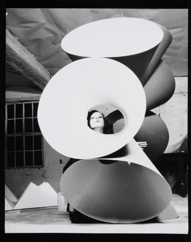 Models posing with Neville Boden Sculpture