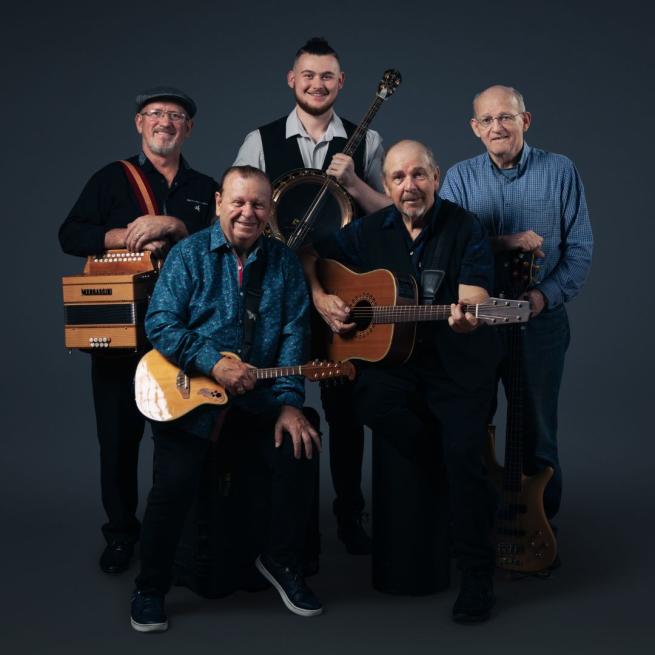 The members of The Fureys with their instruments.