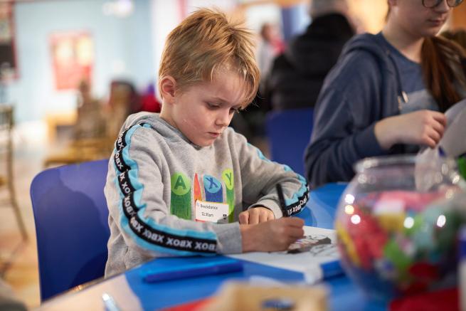 Child doing arts and crafts