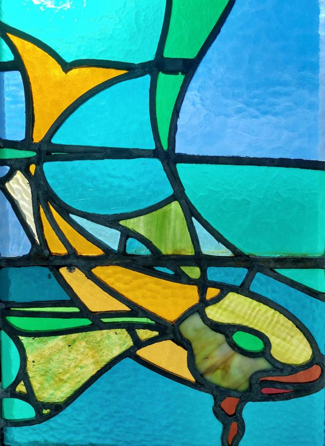 Colourful image of a goldfish made of stained glass