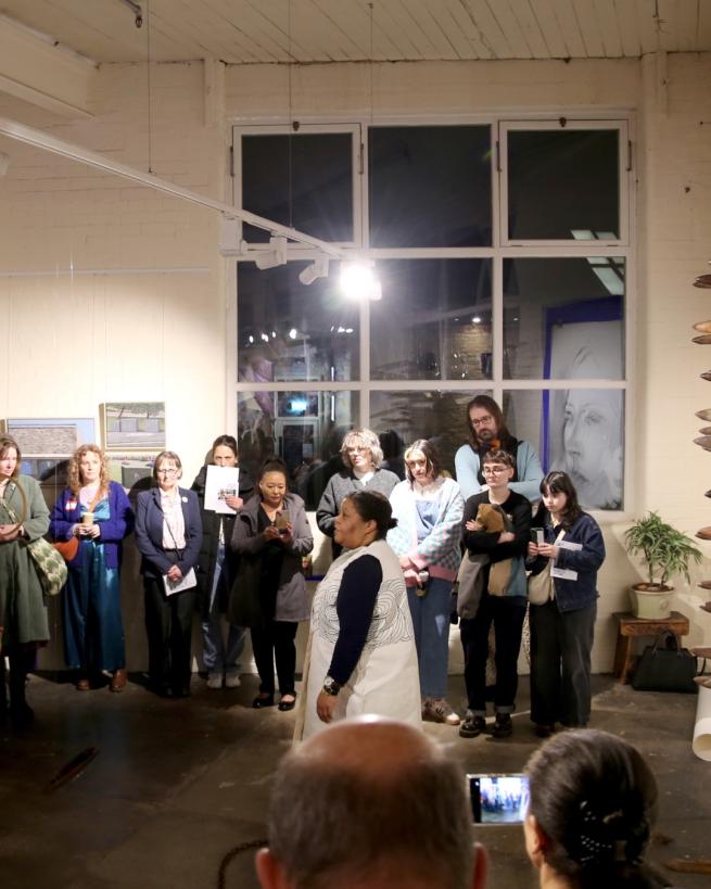 A crowd gathered around artist Linda Cassels during her performance at last year's Ones to Watch exhibition in the Gallery. 