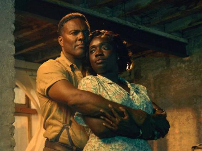Middle aged black Couple embracing  