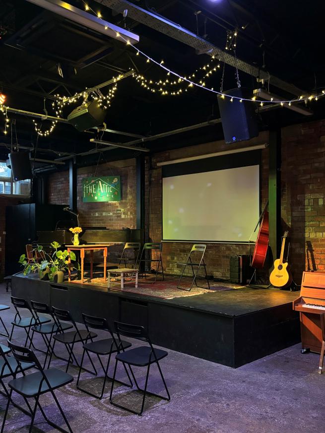 The Attic music venue, set up for a musical performance. 
