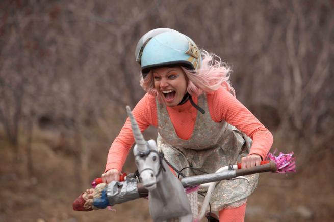 Girl on a unicorn bike